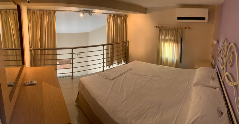 Side Sea View Loft Apartment bedroom